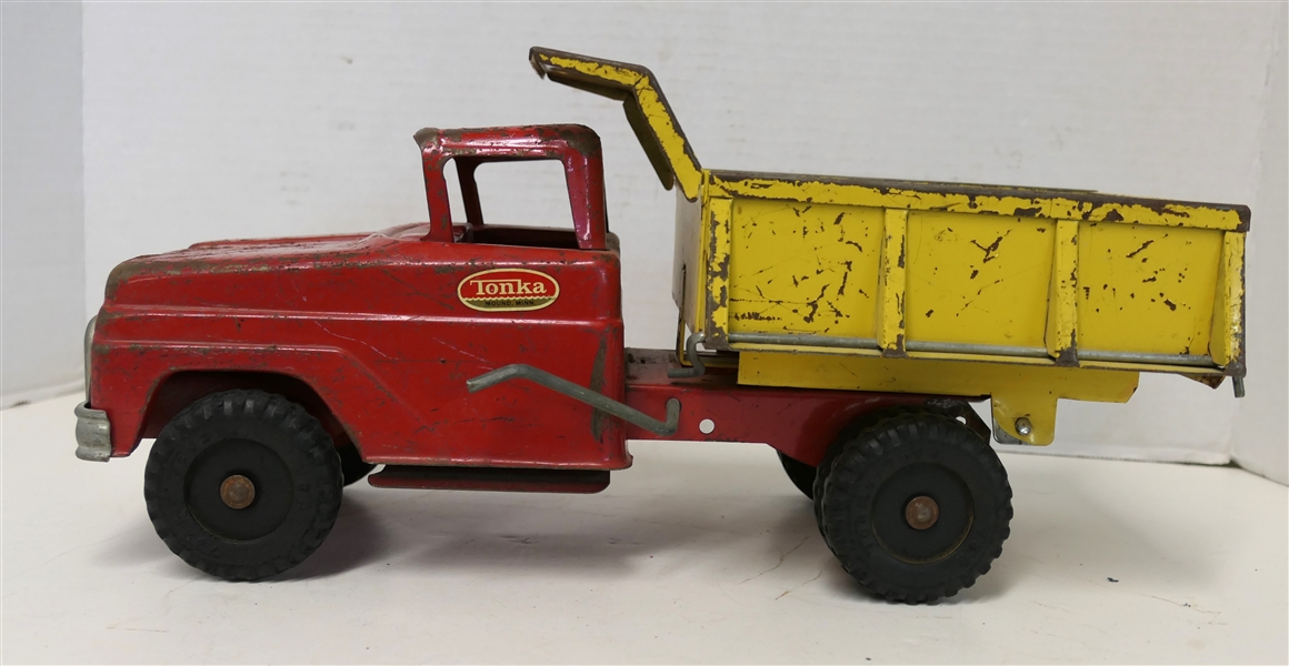 Tonka Red and Yellow Pressed Steel Dump Truck - Measures 7" Tall 14" Long - Played With Condition - Missing 1 Pin on Bed