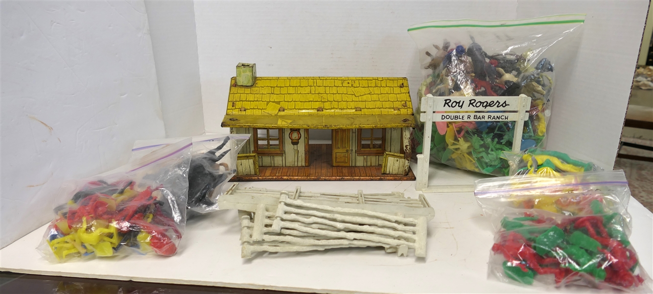 MARX Tin Litho Cabin, Roy Rogers Double R Bar Ranch Sign, Plastic Fence Pieces, and Plastic Cowboy, Indians, Horses, and Other Toys