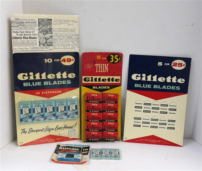 Gillette Blue Blades in Dispenser Cardboard Counter Display with Packs of Razors, Thin Gillette Blades Display with Boxes of Blades, Gillette Blue Blades Display, and Several Boxes of Blades 