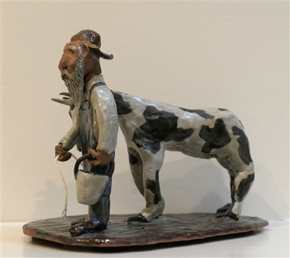 Jim Havner (Robbins, NC)  Art Pottery Farmer with Cow Sculpture - Signed JH CMD 2002 - "Mud Critter" Statue Measures 6" tall 8" Long