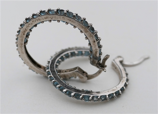 Pair of Sterling Silver Hoop Earrings with Blue Stones on Inside and Outside - Each Earring Measures 1" Across