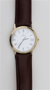 14kt Yellow Gold Concord Gentlemans Dress Watch with Date - Roman Numeral Markers - Sapphire Crown - Number 2278222 / 111931 - DeBeer Paris Leather Band - Watch Measures 1 1/4" Across 