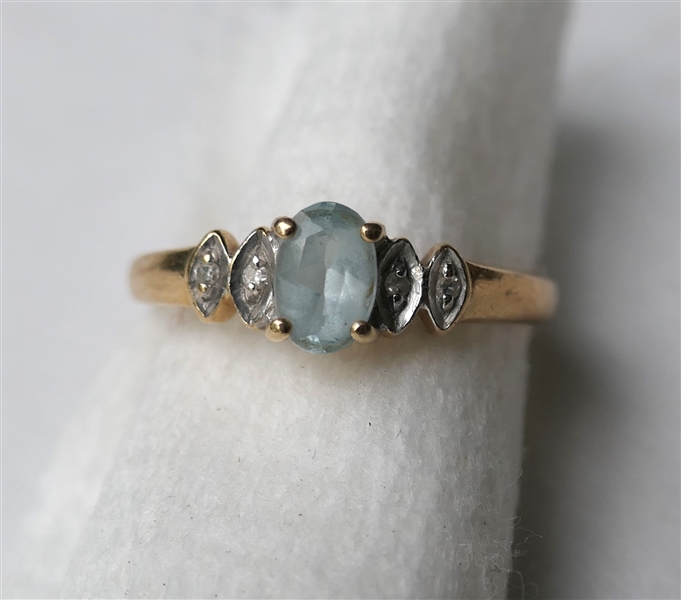 14kt Yellow Gold Ring with Light Blue Center Stone and Diamond Accents - Size 5 3/4 - Weighs 2 Grams