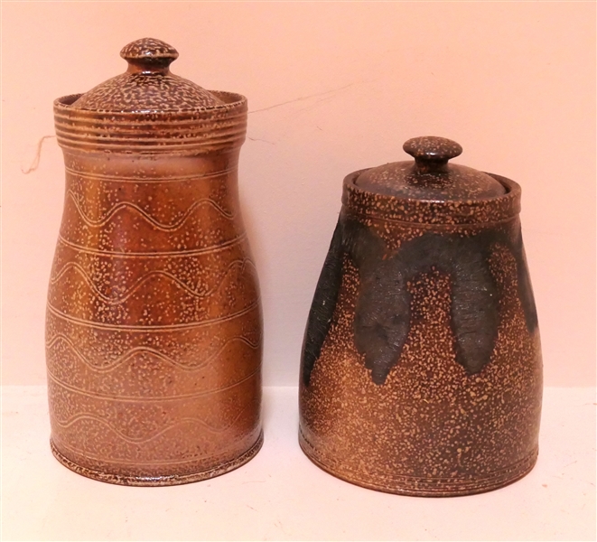 2 Mark Hewitt Art Pottery Jars with Lids - Smaller with Dark Textured Glaze Details - Signed WMH "J" and Larger With Incised Rings and Wavy Lines Signed WMH Hj 95 - Measuring 9" Tall 