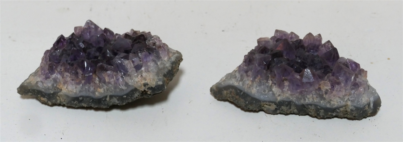 2 Amethyst Crystal Geode Specimens - Largest Measures 2" Tall 4" Across