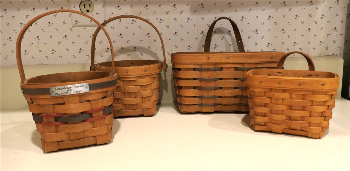 4 Longaberger Baskets - 1989 "Inaugural Basket", 2 Hanging Wall Baskets, and Other Smaller Basket with Folding Handle - Inaugural Basket Measures 4 1/4" tall 5 1/2" across - Not Including Handle 