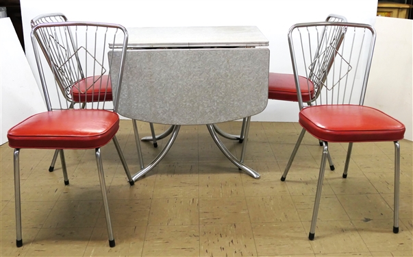 Outstanding 1950's Red Kitchen Table with 4 Red and Chrome Chairs - Table Has Drop Sides - 4 Red and Chrome  Chairs - Table Measures 28 1/2 Tall 30 by 21 Not Including Leaves - Leaf Measures 15