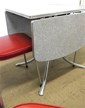 Outstanding 1950's Red Kitchen Table with 4 Red and Chrome Chairs - Table Has Drop Sides - 4 Red and Chrome  Chairs - Table Measures 28 1/2 Tall 30 by 21 Not Including Leaves - Leaf Measures 15