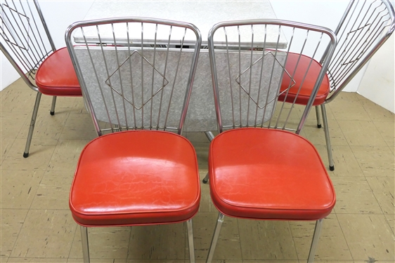 Outstanding 1950's Red Kitchen Table with 4 Red and Chrome Chairs - Table Has Drop Sides - 4 Red and Chrome  Chairs - Table Measures 28 1/2 Tall 30 by 21 Not Including Leaves - Leaf Measures 15