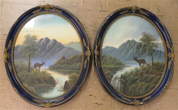 Pair of Edwardian Period Paintings of Scottish Highlands Scenes  - Landscapes with Stags - Signed by Artist - Framed in Navy Blue Oval Frames - Each Measures 24 by 20 