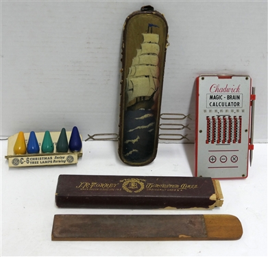New Old Stock C-6 Christmas Tree Lamps, Chadwick Magic- Brain Calculator, J.R. Torrey Razor Sharpener, and Sailing Ship Motif Holder - Missing Several Clips 