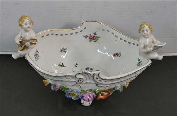 Meissen Style Porcelain Centerpiece Bowl with Applied Porcelain Flowers and Cherub Musicians - Signed Schierholz - Handmalaeri  - Flowers are in Excellent Condition Measures 7 1/2 tall 11 by 6 1/8