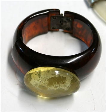DKCo. Lucite and Metal Necklace- Needs to Be Retied, Pair of Lucite Hook Earrings, and Amber Lucite Cuff Bracelet 