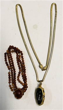 Long Gold Tone Necklace wth Double Sided Face Pendant and Amber Style Beaded Necklace - Long Necklace Has Some Gold Loss - Chain Measures 46