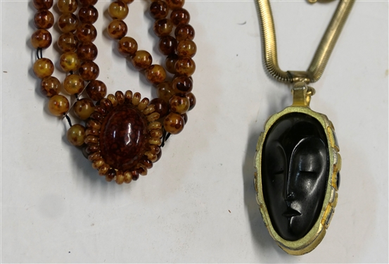Long Gold Tone Necklace wth Double Sided Face Pendant and Amber Style Beaded Necklace - Long Necklace Has Some Gold Loss - Chain Measures 46