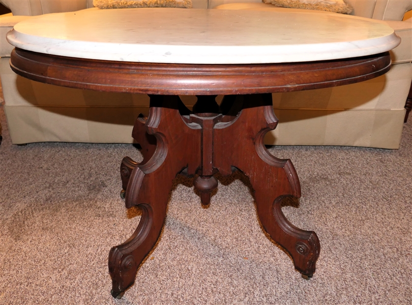 Oval Victorian Marble Top Coffee Table - Table Measures 20" Tall 29" By 21" 