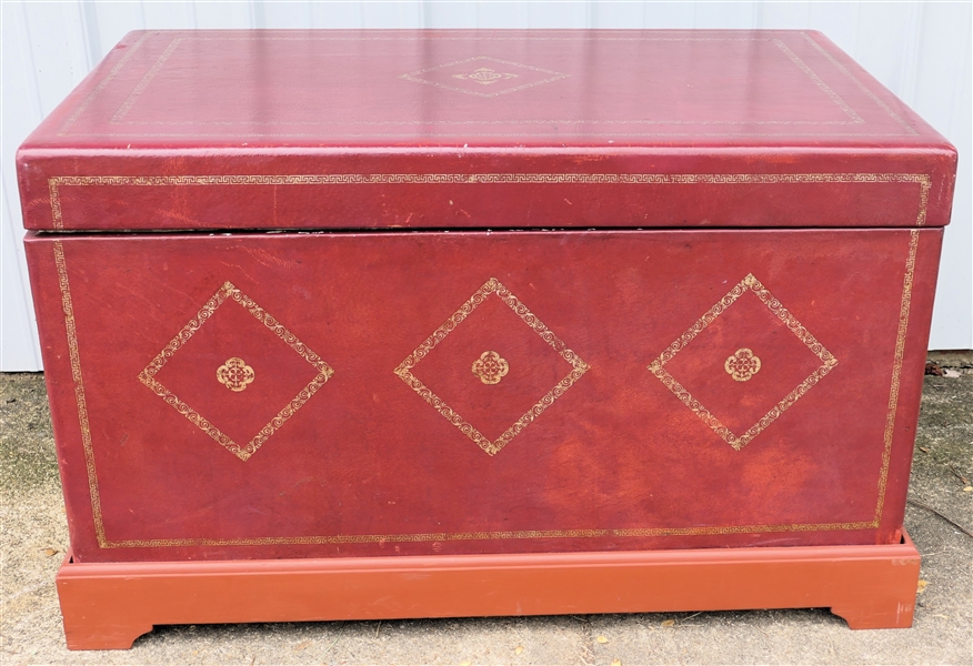 Burgundy Leather Wrapped Trunk with Gold Accents - Nice Substantial Brass Handles - Wood Frame - Marbleized Interior - Measures 22" tall 36" by 21 1/2" 