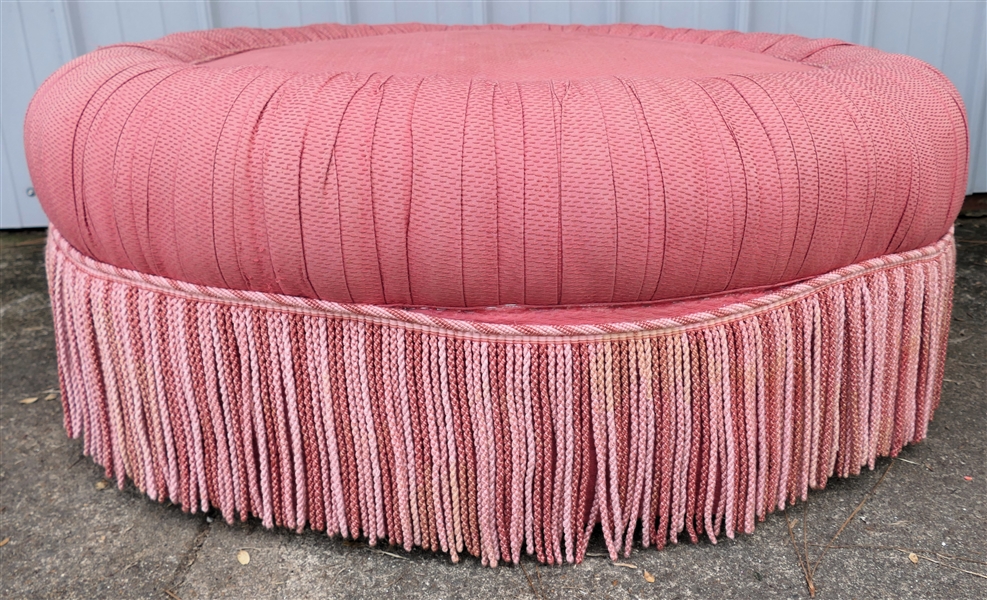 Mauve Oval Ottoman with Mauve and Pink Braided Tassel Trim - On Castors - Rolls Well  - Measures 14" Tall 37" By 34" 