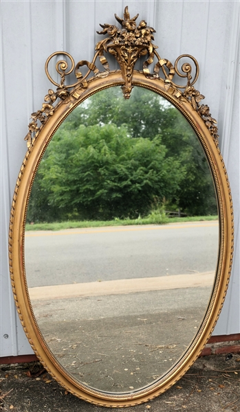 Beautiful Oval Gold Gilt Mirror - Floral Crest - with Scroll and Flower Trim - Mirror Measures 43" by 23"  - Minimal Gold Loss