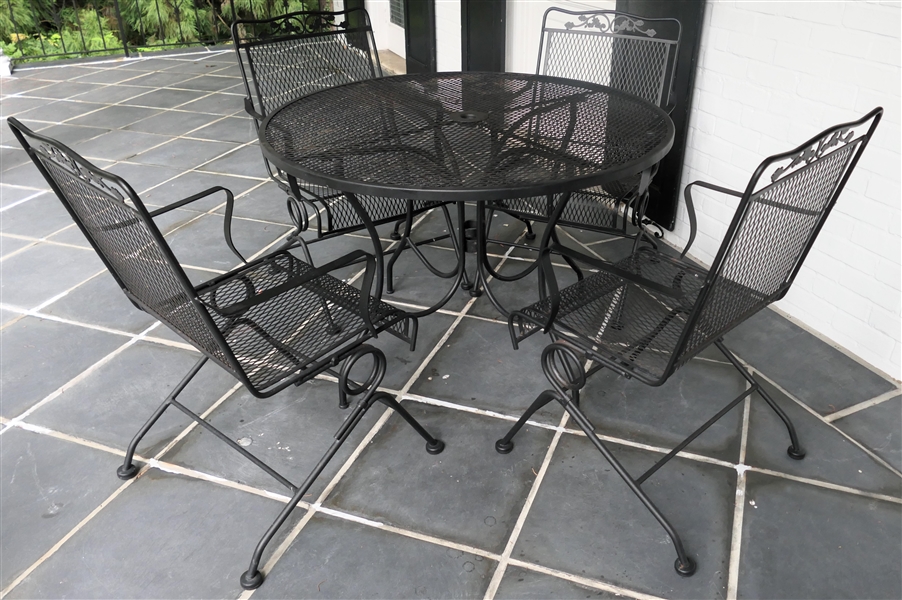 Wrought Iron Garden / Patio Table and 4 Spring Back Chairs - Leaf  Accents on Chair Backs - Table Measures 42" Across