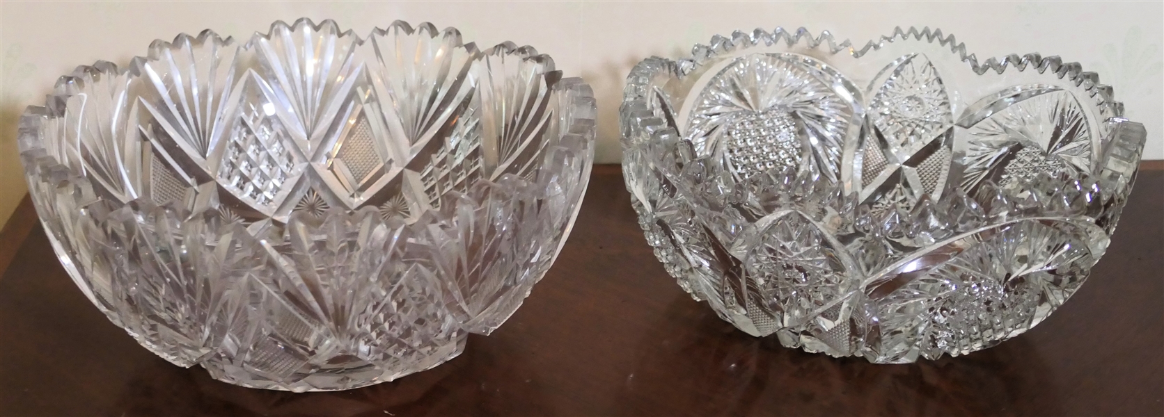 2 Crystal Bowls - Cut Crystal and Press Glass - Both Have Some Minor Chips around Edges - Cut Glass Bowl Measures 4 1/2" tall 9" Across - Press Glass Measures 4" tall 9" Across