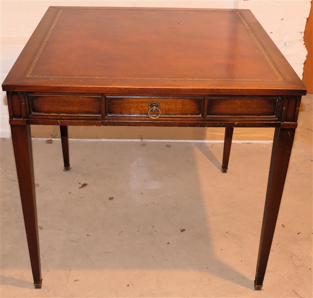 Mahogany Leather Topped Card Table with Drawer- Leather Top Has Good Gold Boarder - Tapered Legs with Brass Tipped Feet  - Table Measures 29" tall 31" by 31" 