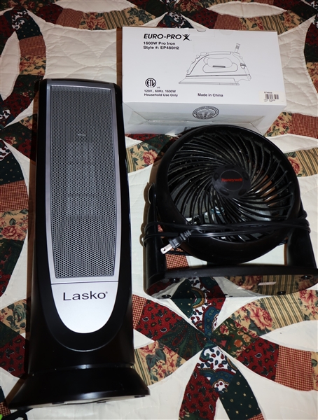 Euro Pro 1600W Pro Iron New in Original Box, Lasko Ceramic Heater, and Honeywell Tabletop Fan