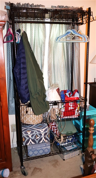 Clothing Storage Rack with Storage Basket and Shelve- Attached Hooks -Rack is On Wheels - Measures 72" Tall 48" by 24" 