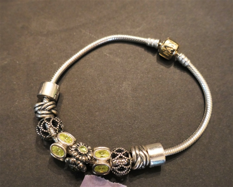 Pandora Sterling Silver Bracelet with 9 Sterling Silver Beads - 3 With Peridot Stones - Bracelet Measures 8" 