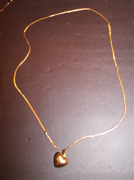 14kt Yellow Gold Herringbone Chain Necklace and 14kt Yellow Gold Heart Pendant - 9 Grams Total Weight - Necklace Has Some Kinks