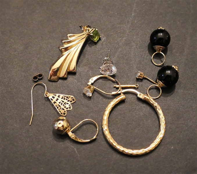 Mixed Lot of Gold Jewelry including 14kt Hoop, 14kt Studs, and Other Mis Matched Earrings - Approx. 8 Grams Total Weight