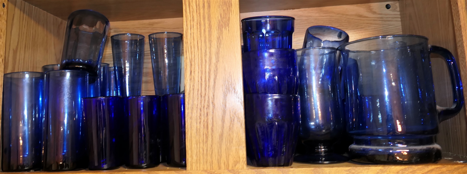 Cabinet Lot of Cobalt Blue Glassware - Pitcher, Glasses, Mugs, Case