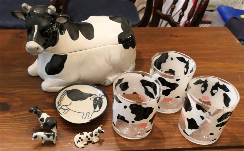 Collection of Cows including 3 Stoffer Acrylic Tumblers, KD Art Pottery Cow Ring Bowl, Otagiri Cow Dish, and 2 Miniature Cowls - 1 with Broken Horns - Large Cow Measures 8" Tall 9" Long