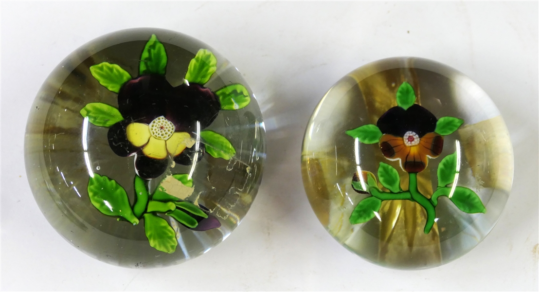 2 Art Glass Paperweights with Pretty Pansy Flowers Inside - Largest Measures 1 1/2" tall 3" Across Smaller Measures 1" 2 1/4" Across