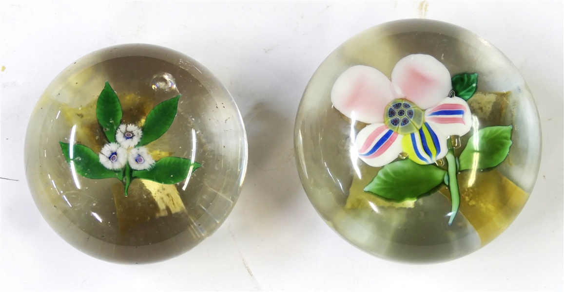 2 Art Glass Paperweights with Flowers - Dogwood with Millefiori Center and Smaller with 3 Flowers -  Largest Measures 1 1/2" Tall 3" Across Smaller Measures 2 1/2" Across