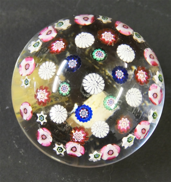 Beautiful Millefiori Art Glass Paperweight with Many Evenly Spaced Millefiori Flowers - Pinks, Greens, Whites, and Blues - Measures 2" Tall 3 1/2" Across