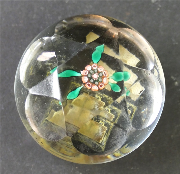 Small Faceted Art Glass Paperweight with Single Millefiori Flower in Center with Green Leaves - Measures 1 1/4" by 2 1/4"