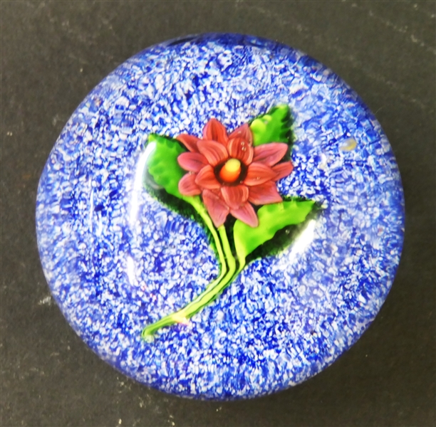 Pretty Burgundy Flower Art Glass Paperweight with Blue and White Speckled Background  - Measures 1 1/2" tall 2 1/2" Across