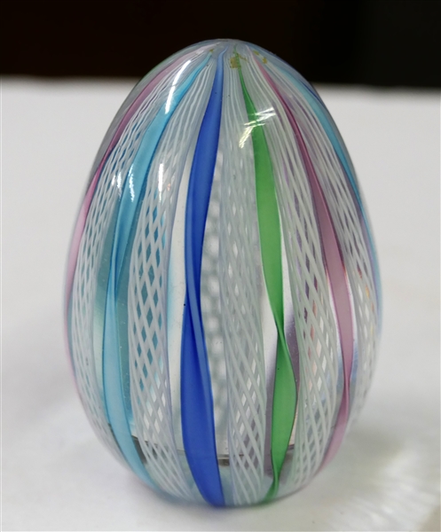 Hand Blown Egg Shaped Art Glass Paperweight with Pink, Blue, Green, and White Threading - Paperweight Measures 2 1/2" Tall 