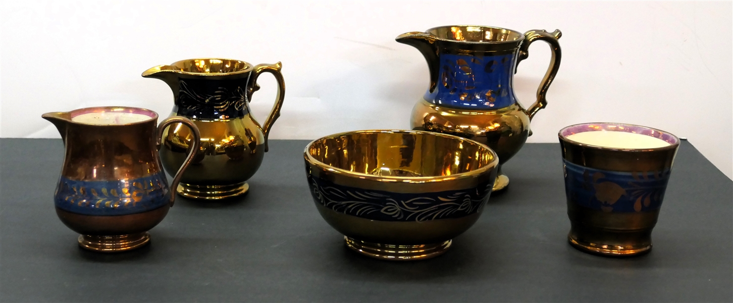 5 Pieces of Copper Lustre including 3 Pitchers, Cup, and Bowl - Largest Pitcher Measures 5 3/4" Tall, Bowl Measures 3" tall 5 1/2" Across, Cup Measures 3 1/4" Tall 3 1/2" Across