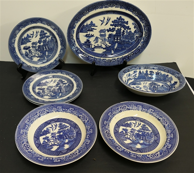 7 Pieces of Blue Willow - 2 Homer Laughlin Rimmed Soup Bowls and 5 Pieces of Johnson Brothers - Oval Bowl Has Hairline - Oval Platter, and 3 8" Plates