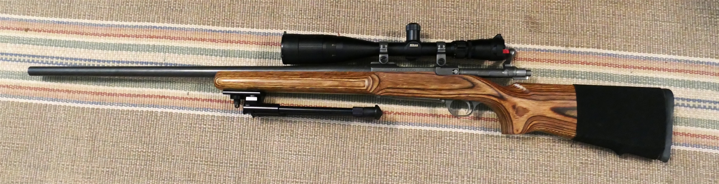 Ruger M77 Mark II Bolt Action Rifle - 22- 250 REM  with Nikon 6.5 - 20x44 Scope - Attached Shooting Stand and Ammo Sleeve - Beautiful Wood Grain Stock - Serial Number 785-04626 - Extra Clean 