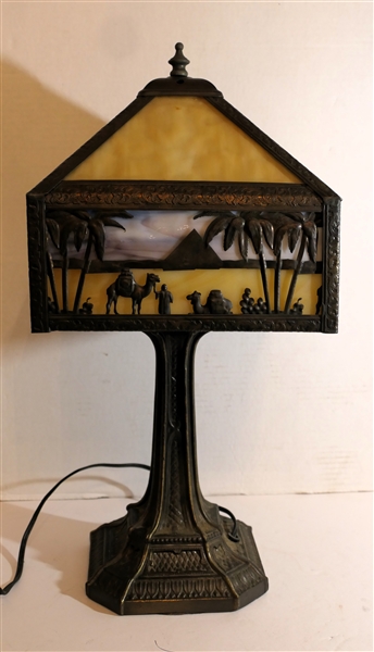 Unusual Egyptian Scene Leaded Glass Lamp with Fancy Metal Base - Cream and Blue Slag Glass - One Glass Panel is Broken - Lamp Measures 20" Tall Shade Measures 9" By 9" 