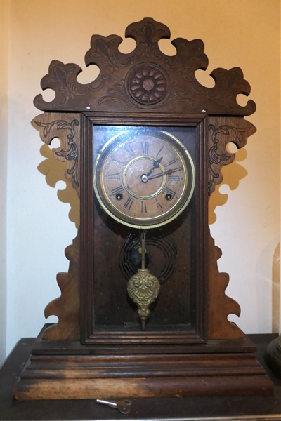 Walnut Case Striking Clock - Walnut Press Carved Case with Fancy Pendulum and Key - Clock Case Measures 23" Tall 15" by 5" 