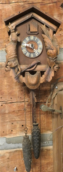 Wood Cuckoo Clock with Hare and Bird - Clock Has Weights and Pendulum  - Case Measures 11" Long