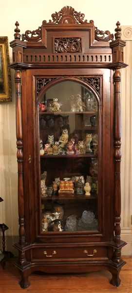 Ornate Mahogany Display Cabinet - Carved Top Crest, Door, and Columns, Wood Shelves Inside, Beveled Glass Door and Sides  - Drawer At Bottom - Claw Feet - Cabinet Measures 88 1/2" Tall 37" By 20" 