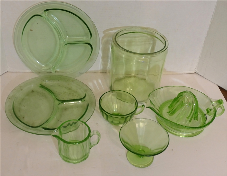 7 Pieces of Green Depression Uranium Glass including Grill Plates, Jar, Creamer, Sherbet, Cup, and Juicer - Juicer Has Chip 