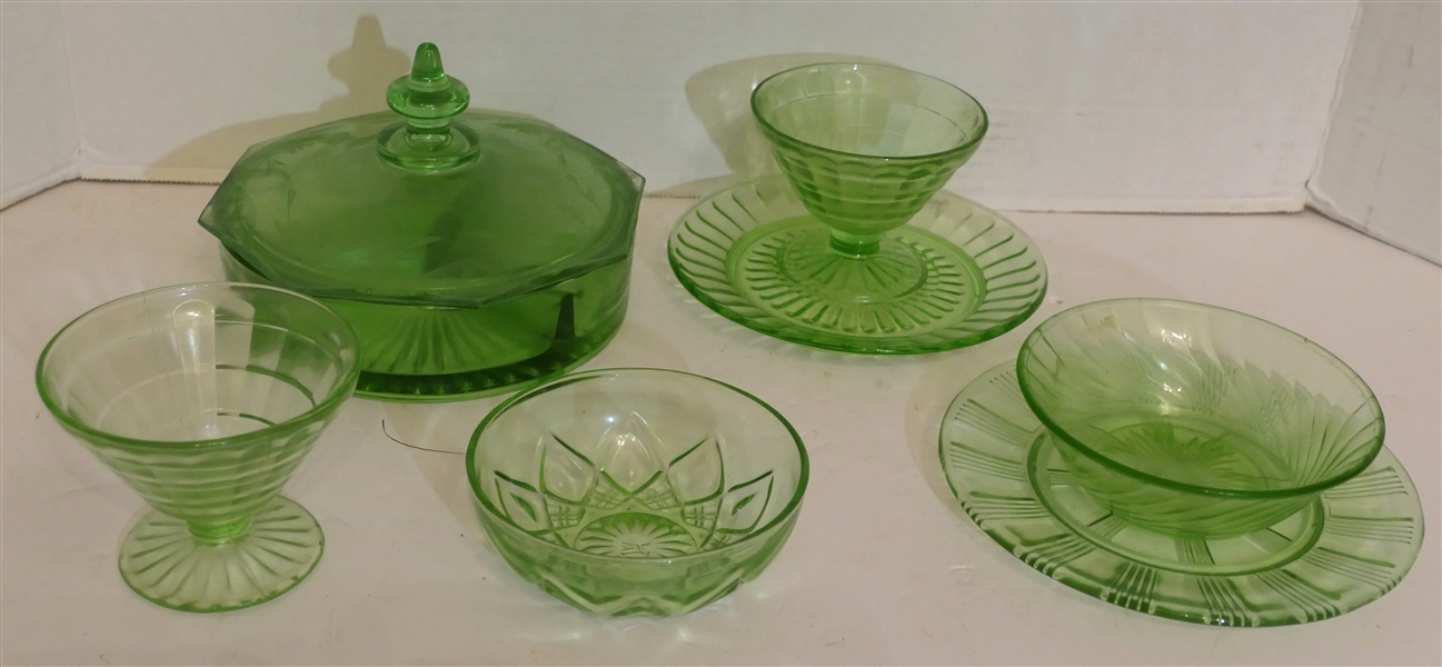 7 Pieces of Green Depression Uranium Glass including Sherbets, Covered Divided Dish, Plates, and Bowls - 