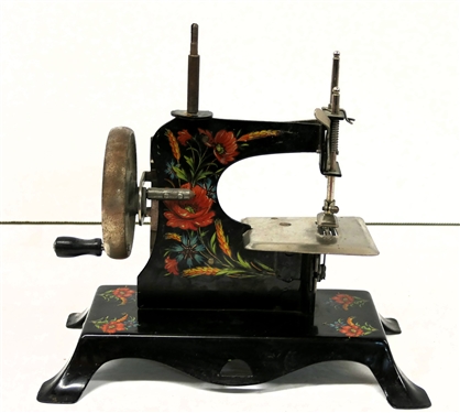 Casige British Zone German Childs Metal Sewing Machine - Crank Driven with Applied Flowers - Machine Measures 7 1/2" Tall 