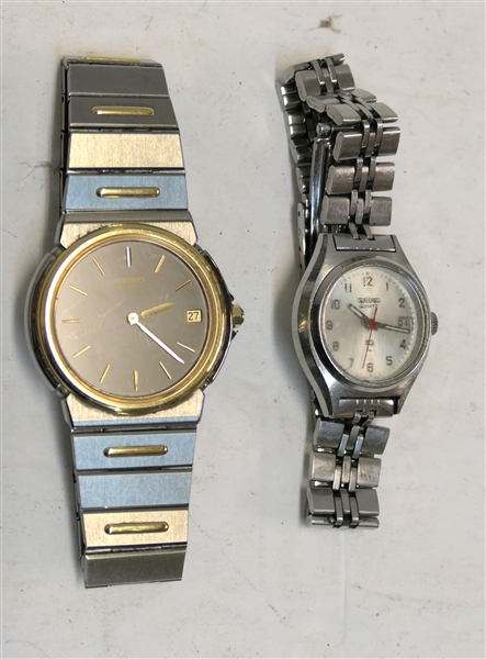 2 - Seiko Wrist Watches - Mens Quartz with Chocolate Dial and Womens with Pearl Dial and Date